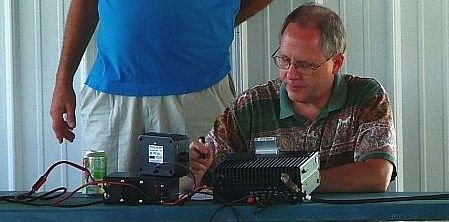 Jim Graver, Owner of Web-Rx Consulting,  operating an amateur radio during Field Day.